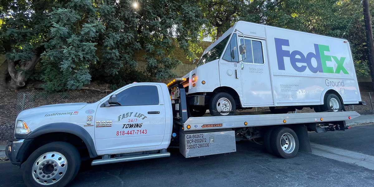 Fedex truck being towed